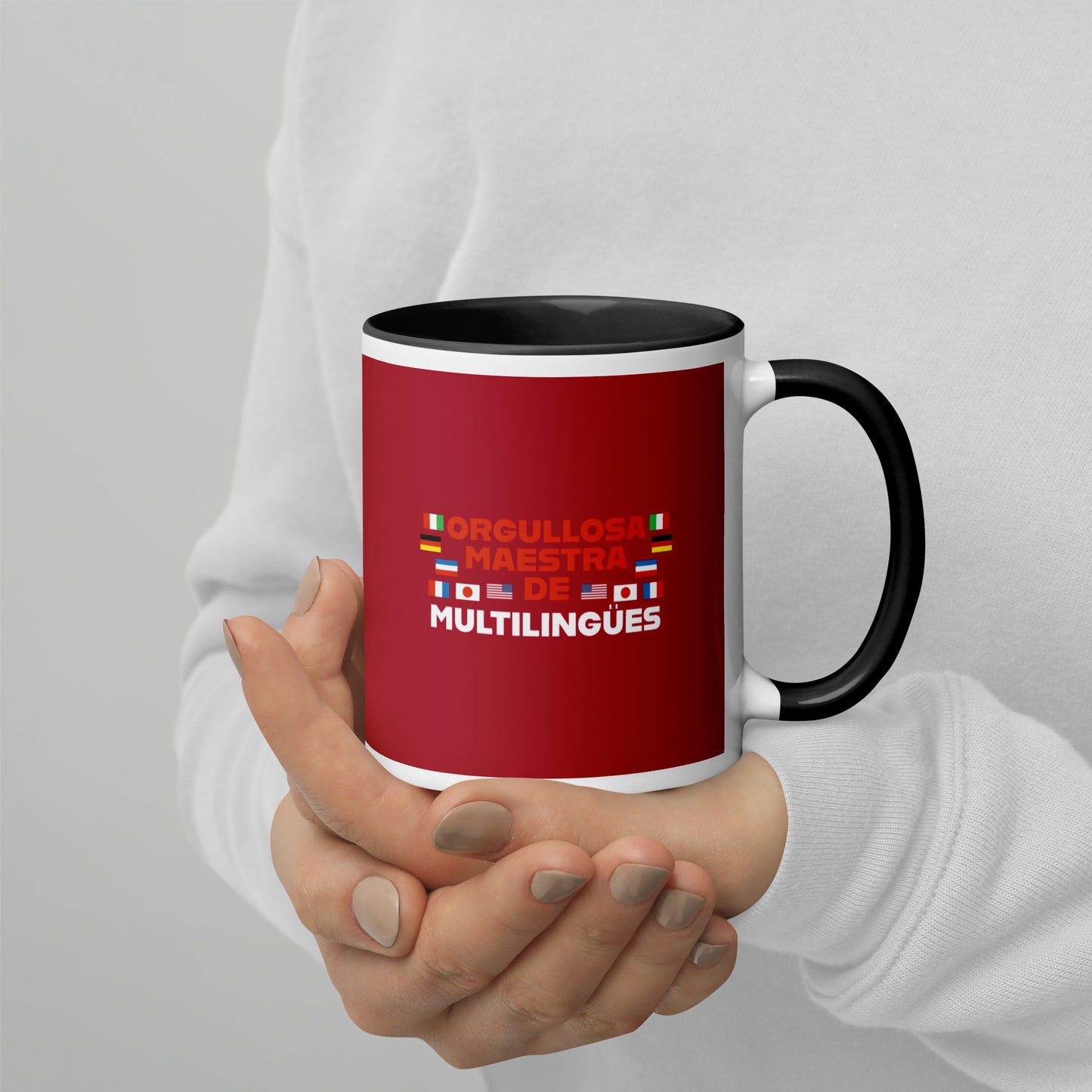 Taza de profesor multilingüe con interior de color.