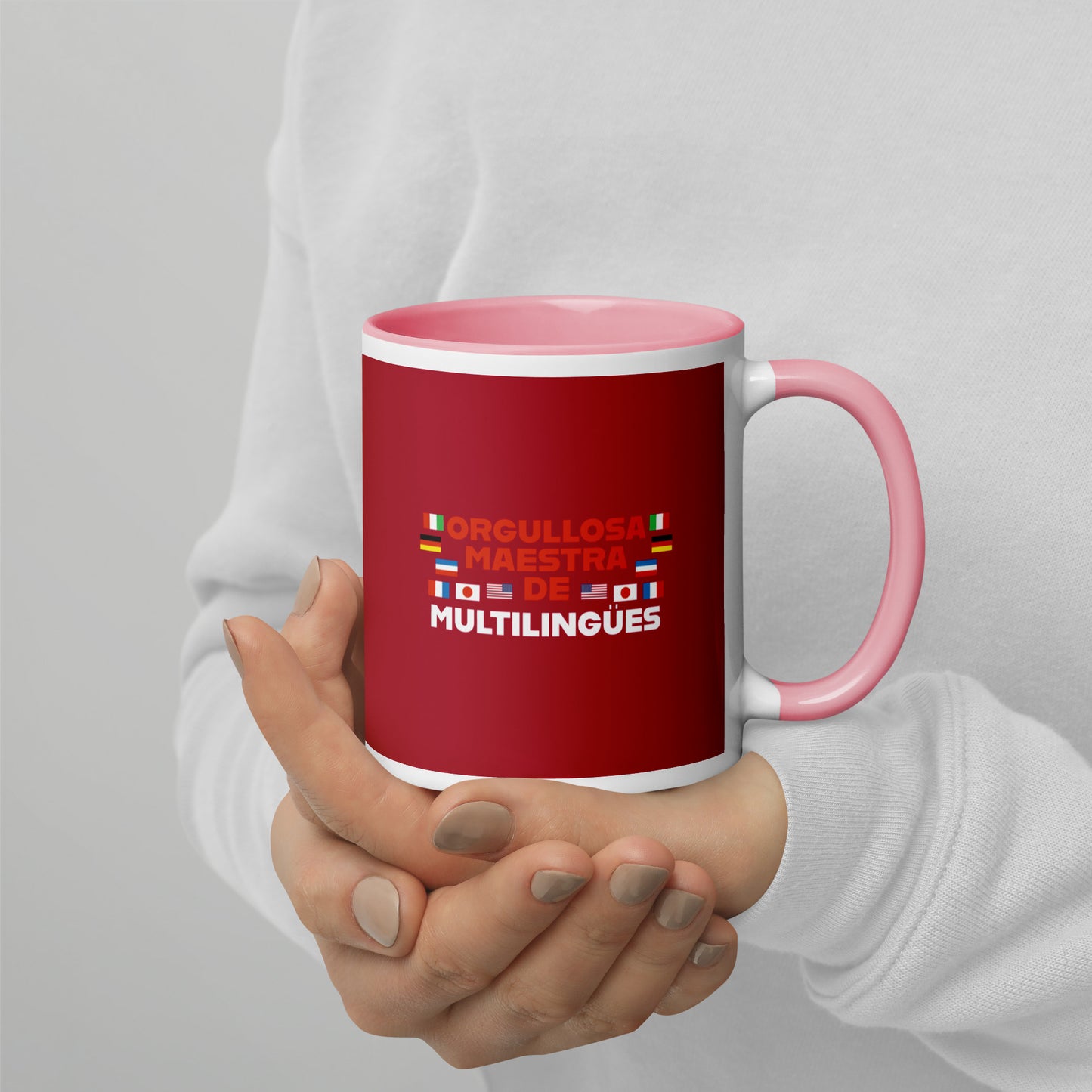 Taza de profesor multilingüe con interior de color.