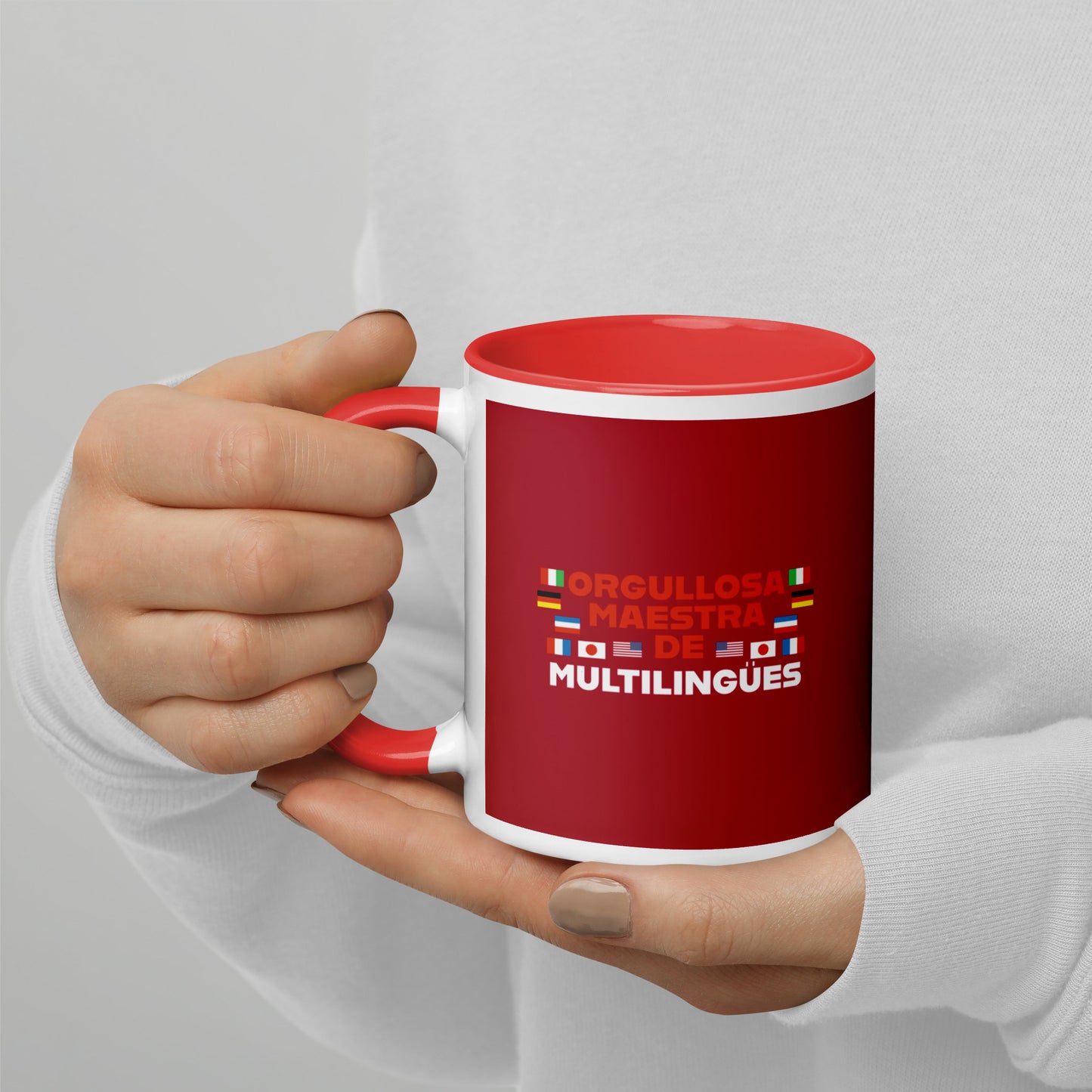 Taza de profesor multilingüe con interior de color.