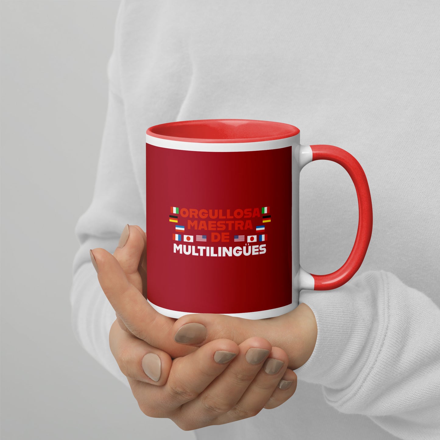 Taza de profesor multilingüe con interior de color.